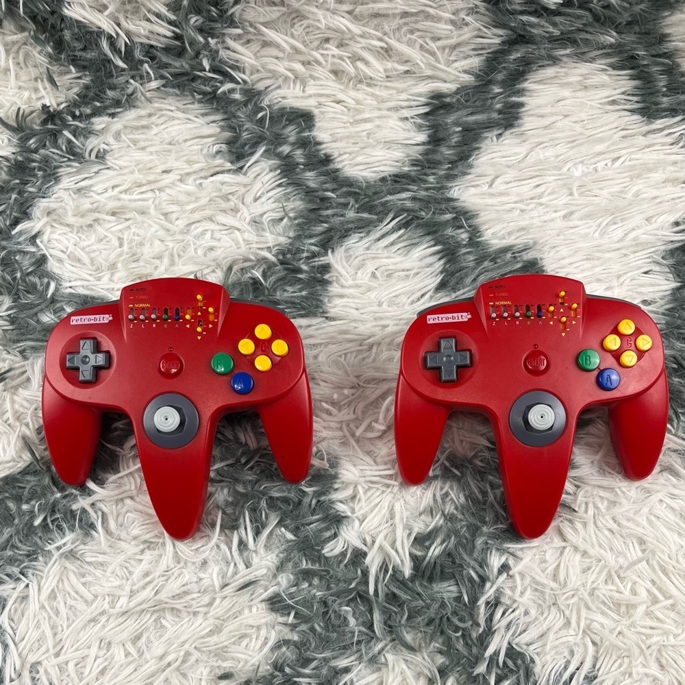Two Red Nintendo 64 Wireless Retro-bit Controllers with Battery Packs NOT TESTED